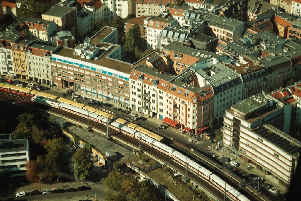 Wide photograph of the trainline from Berlin TV tower, Fujifilm aesthetic